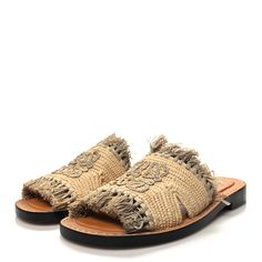 These are authentic pair of LOEWE Raffia Fringe Mules Sandals size 35 in Beige. These stylish espadrilles are crafted of beige. Mules Sandals, Mule Sandals, Mule, Espadrilles, Sandals