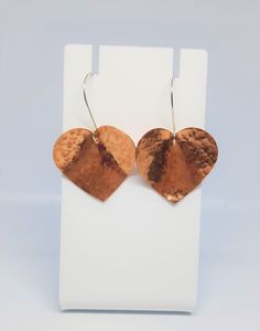 Hammered Texture Effect Domed Copper Heart and Sterling Silver Earrings I love having a good selection of earrings, that you can just throw on, and they look good with anything.  These earrings are exactly that! These lovely copper hearts have been hammered to add texture, then domed and added to lovely round shaped sterling silver earwires. Simple, but effective! Will be supplied on an earring card, with a free care card. Metal Earrings With Ear Wire For Valentine's Day, Metal Ear Wire Earrings For Valentine's Day, Handmade Metal Earrings For Valentine's Day, Valentine's Day Handmade Metal Earrings, Heart-shaped Silver Copper Jewelry, Silver Heart-shaped Copper Jewelry, Heart Shaped Metal Earrings For Valentine's Day, Heart-shaped Metal Earrings For Valentine's Day, Rose Gold Metal Heart Earrings For Valentine's Day