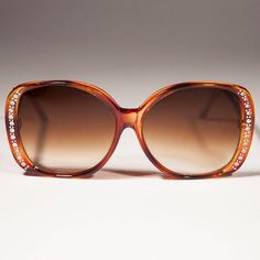 Super cute square oversized women's sunglasses with rhinstone edge.   New old stock.  Never worn. Great condition. UV protection. NOS deadstock  Made in HONG KONG 1980's FIT INFORMATION: 57 mm Eye Size 16 mm Bridge 140 mm Temple/Arm Shop more Vintage Sunglasses @ https://www.etsy.com/shop/SunglassMuseum Steampunk Woman, Sunglasses Women Oversized, Wholesale Gifts, Oversize Women, Kids Sunglasses, Vintage Sunglasses, Women's Sunglasses, Grey Lenses, Sunglasses Vintage