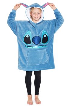 PRICES MAY VARY. Disney fleece snuggle hoodie for kids and teens in a range of cute Disney character designs Officially licensed Disney merchandise Features a cosy sherpa lined hood, long cuffed sleeves, and a roomy kangaroo pocket. Made from high-quality fleece (100% polyester) Comes in 1 size fits all for kids and teens, see images for the measurement chart Looking for Disney gifts for girls or boys? This comfy blanket hoodie makes a great stocking filler for Christmas or gift for birthdays or Stitch Merchandise, Stitch Gifts, Hoodies For Girls, Lilo And Stitch Merchandise, Disney Hoodie, Cute Disney Characters, Lilo Und Stitch, Disney Clothing, Stitch Toy