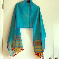 Size: Length 78”, Width 22” Style: Handwoven, Indian Ethnic Cotton Shawl With Tassels Color: Turquoise Blue, With Red And Yellow Stripes Material: Fine Cotton Style Comments: Perfect For Warmer Climes Condition: New With Tag. Ps: Has A Few Imperfections. Pls See Photos 6 & 7 Home: Comes From A Smoke-Free Home Message Me With Questions! Sparkly Scarf, Hermes Twilly Scarf, Cotton Shawl, Michael Kors Scarf, Purple Scarves, Wool Wrap, Floral Sleeveless Top, Knit Infinity Scarf, Fur Scarf