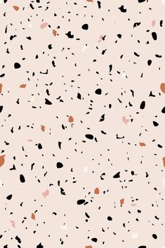 black and white speckles are scattered on a light pink background with orange dots