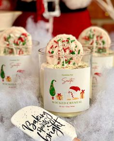 some white frosted christmas cookies in small cups