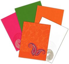 four different colors of paper with paisley designs on the front and back, one in pink, green, orange, and white