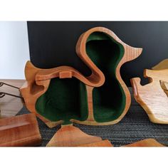 several pieces of wood sitting on top of a table