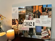 a desk with some pictures and candles on it