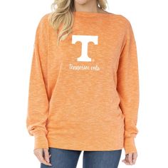 Stay cozy on chillier Tennessee Volunteers game days with this Lainey Ribbed Tunic sweatshirt. It features a printed graphic on comfy tri-blend fabric and a stylish boat neck. A banded hem and double knit cuffs complete the look, making this pullover an elevated way to display your unwavering Tennessee Volunteers fandom. Collegiate Letter Print Tops For Loungewear, Collegiate Letter Print Top, Collegiate Spring Loungewear Tops, Spring Collegiate Loungewear Tops, Collegiate Style Tops For Spring Loungewear, Casual Tops For Fall Game Day, Casual Brushed Fabric Top For Fall, Casual Tops With Brushed Fabric For Fall, Winter Game Day Relaxed Fit Tops