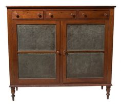 an old wooden cabinet with glass doors on the top and bottom, against a white background