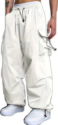 White Baggy Pants For Outdoor, White Baggy Cargo Pants With Hip Pockets, Baggy White Utility Cargo Pants, Baggy White Parachute Pants With Pockets, White Baggy Utility Cargo Pants, White Parachute Pants With Hip Pockets For Streetwear, White Parachute Pants With Multiple Pockets For Streetwear, White Baggy Parachute Pants With Pockets, White Baggy Pants With Multiple Pockets