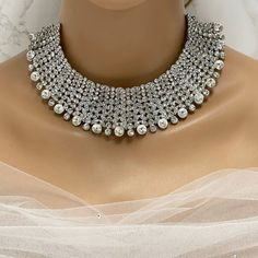 Indian Wedding Jewelry Set, Bridal Choker Necklace Earrings, Elegant Silver Kundan Bridal Set, Bollywood Fashion Jewelry, Perfect Wedding Gift, Bridal Choker Necklace Earring Set, Silver Kundan Indian Wedding Jewelry, Bollywood Bridal Jewelry, Stunning Wedding Gift, Silver Kundan Bridal Indian Jewelry Set, Elegant Choker Necklace Earrings, Bollywood Fashion Jewelry, Ideal Wedding Gift Enhance your bridal ensemble with our exquisite Indian Wedding Jewelry Set, an essential addition to any bride's Rhinestone Metal Jewelry Sets For Weddings, Wedding Rhinestone Metal Jewelry Sets, Bling Jewelry Sets For Wedding, Bling Metal Jewelry Sets For Wedding, Wedding Jewelry Sets With Bling And Metal, Wedding Jewelry Sets With Bling, Bridal Metal Necklace With Rhinestones For Wedding, Metal Bridal Necklace With Rhinestones For Wedding, Silver Bridal Sets With Rhinestones For Wedding