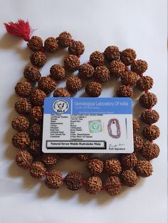 7 Mukhi Rudraksha Kantha  / Seven Face Rudraksha Mala / Laxmi  Siddha Mala / MahaLaxmi Mala  - (55 Beads)- Nepal Design : 55 Piece of Seven Mukhi  rudraksha  which is design in silk thread. Dimesion of Beads : 15 mm - 17 mm Origin : Nepal Description : SAAT MUKHI RUDRAKSH (SEVEN FACED RUDRAKSH) FOR WEALTH AND ABUNDANCE. IT REPRESENTS GODDESS OF WEALTH MAHALAKSHMI. 7 mukhi Rudraksh is provider of money luck to the wearer. It helps in shining in the field of business or service. It therefore also Temple Jewelry Mala With Gemstone Beads For Festivals, Temple Jewelry Style Mala With Gemstone Beads For Festivals, Traditional Gemstone Beads Mala For Puja, Diwali Mala With Tilla And Round Beads, Traditional Hand-strung Temple Necklace For Festivals, Traditional Mala With Polished Beads For Festivals, Traditional Round Mala With Gemstone Beads, Red Hand-strung Mala For Puja, Traditional Silver Hand-strung Mala