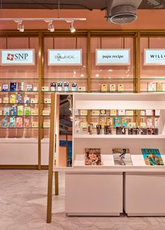 the inside of a book store with shelves full of books