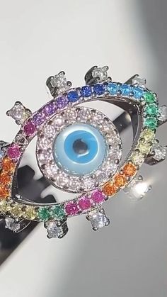 The Lush Label Ojito Ring Rings Evil Eye Evil Eye Jewelry Fine Jewelry #evileyejewelry #finejewelry Round Cubic Zirconia Ring With Diamond Eyes, Fine Jewelry Silver Rings With Diamond Eyes, Betty Boop Jewelry, Money Girl, Evil Eye Design, Gold Jewelry Stores, Feather Ring, Rainbow Jewelry, Magical Jewelry