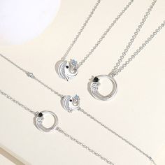 This eye-catching Matching Ocean Theme Couple Necklaces Set is crafted from high-quality white gold-plated sterling silver and decorated with sparkling Cubic Zirconium stones. The perfect accessory and a great gift idea to show your special someone you care. Material: White Gold Plated 925 Sterling Silver + Cubic Zirconia Men Chain Length: 50cm~19.6inches Women Chain Length: 45cm~17.8inches Men Chain, Necklaces Set, Women Chain, Couple Necklaces, Ocean Theme, Ocean Themes, Chains For Men, Gold Plated Sterling Silver, Chain Lengths