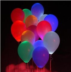 an image of balloons in the dark with caption that reads, glowing balloons just add glow stick before blowing up