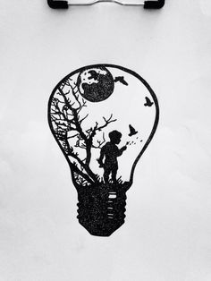 a black and white drawing of a person inside a light bulb