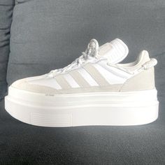 These Platform Sneakers Are Cream And White, Super Cute And Platform! They Are Technically A Size 8 Women’s But They Run Small So They Are A True Size 7 Women’s. Super Comfortable (I Own Them In A Bigger Size) Also Comes With A Ivy Park Draw String Bag. Perfect For The Shorter Girlies Who Like A Little Extra Height, If You’re A Beyonce Fan, Or Simply Just Love A Sick Set Of Sneakers! Sporty Platform Sneakers With White Laces, White Sporty Platform Sneakers With Laces, Sporty White Platform Sneakers With Laces, White Chunky Sneakers With Boost Midsole For Athleisure, White Athleisure Chunky Sneakers With Boost Midsole, Adidas White Platform Sneakers For Sports, Athleisure Sneakers With White Laces And Round Toe, White Adidas Sporty Platform Sneakers, Adidas White Sporty Platform Sneakers