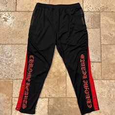 Chrome Hearts Snap Hardware Black / Red Stripe Track Pants Great Condition Size Xl Rare Pair Of Chrome Hearts Black / Red Stripe Track Pants Tearaway Sterlin Silver Hardware Buttons Lamb Leather Details Measurements: Waist: 15.75” Inseam: 28.5” Front Rise: 13.5” Leg Opening: 7” Chrome Hearts Pants, Hardware Buttons, Red Stripe, Chrome Hearts, Silver Hardware, Track Pants, Black Red, Mens Pants, Black And Red