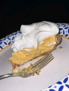 a piece of pie on a plate with a fork