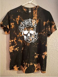 Acid Wash Skull Shirt, floral Skull shirt, acid wash skeleton shirt, Spooky season, Bleached Shirt, acid wash shirt, halloween shirt 100% cotton unisex crew neck T shirt Design is applied to the shirt using high quality heat transfer vinyl. Be sure to check the size chart to ensure correct fit. All shirts are made to order **Bleached shirts are hand bleached by me so while I try to make them as consistent as possible, no two shirts with come out the same. The overall pattern will be the same but Acid Wash Cotton T-shirt For Halloween, Halloween Acid Wash Cotton T-shirt, Halloween Tie-dye Casual T-shirt, Casual Halloween Tie-dye T-shirt, Halloween Casual Tie Dye T-shirt, Casual Tie-dye Halloween Top, Casual Halloween Tie Dye T-shirt, Casual Tie Dye Halloween Tops, Casual Tie Dye Tops For Halloween