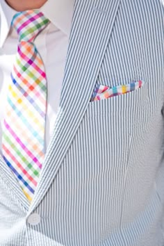 Perfect summer look: seersucker suit with ultra-colorful tie and pocket square over a white shirt....very well done (and cool).... A Man In A Suit, Man In A Suit, Seersucker Suit, Tie And Pocket Square, Mens Fashion Trends