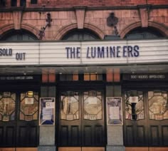 an old theater with the name the luminars on it