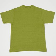 They don't come more iconic than the 1950's pocket tee, and Warehouse & Co Japan have produced one to rival all others. This circular knit tee is woven from a luxuriously soft 100% cotton and boasts a traditional boxy shape. The brand has chosen only the finest cotton to go into their tees, the integrity of which, blended with the traditional knitting style ensures that this garment will maintain its shape for the duration of its lifespan. The traditional loopwheel method of fabric production is Knitting Machines, Henley Tee, Grass Green, Knit Tees, Green Grass, Vintage Knitting, Pocket Tee, Wheel, Japan