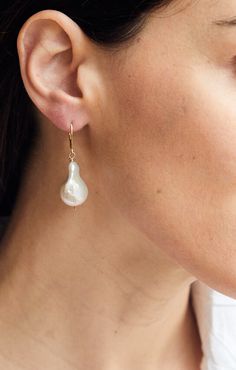 Free shipping over $100, free returns within 30 days. These classic beauties pair with everything, from casual to formal to everything in between. Freshwater baroque pearls (truth & sincerity) on your choice of sterling silver or gold-filled earwires. Length: approximately 1" Each baroque pearl is unique. The ones you receive will be of similar quality as those shown here. We donate at least five percent of every sale to causes that support our mission. Click here for more information. Teardrop Baroque Pearl Earrings For Everyday, Baroque Pearl Teardrop Earrings With Pearl Chain, Baroque Pearl Teardrop Jewelry With Pearl Drop, Everyday Teardrop Baroque Pearl Earrings, Teardrop Baroque Pearl Drop Jewelry, Anniversary Baroque Pearl Matching Earrings Jewelry, Anniversary Baroque Pearl Jewelry With Matching Earrings, Elegant Everyday Baroque Pearl Jewelry, Baroque Pearl Teardrop Earrings With High Luster