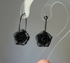 Absolutely black hoop earrings and Necklace  with matt black flowers. Each petal of flower made by hand Flower's size approx 15mm/0.6 in across Length of necklace is adjustable 17,5+ 2 in / 45 +5 cm Dia hooop 25 mm/ 1 inch SET: PENDANT WITH CHAIN AND EARRINGS Polymer clay isn't afraid of water, strong and flexible. Gorgeous gift as handmade item Metal bail in black color (Bails hole 6*4 mm/ 0,23*0,16 inch). ♥All my jewelry come in boxes or bags. If you are purchasing a gift I am happy to include personalized messages with your order. Please leave a note of desired message in the note to seller prior to placing your order. ♥ ALL PENDANTS- https://www.etsy.com/shop/BuduartJewelry?ref=seller-platform-mcnav§ion_id=22665063 If you like this item you can visit my shop: https://www.etsy.com/shop/ Minimalist Matte Black Jewelry For Gifts, Minimalist Matte Black Jewelry Gift, Black Flower Jewelry For Gift, Black Minimalist Hoop Earrings For Gift, Adjustable Black Flower Jewelry, Black Dangle Flower Earrings With Ear Wire, Black Flower Drop Earrings For Gift, Nickel-free Black Hoop Earrings Gift, Black Nickel-free Hoop Earrings As Gift