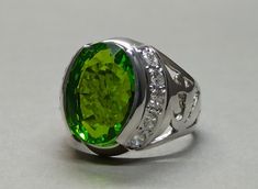 Peridot 925 Sterling Silver Handmade Ring  𝐏𝐫𝐨𝐝𝐮𝐜𝐭 𝐓𝐲𝐩𝐞: Ring 𝐑𝐢𝐧𝐠 𝐒𝐢𝐳𝐞𝐬: 5 US, 6 US, 7 US, 8 US, 9 US, 10 US, 11 US, 12 US, 13 US, 14 US, 15 US, 16 US 𝐌𝐞𝐭𝐚𝐥 𝐓𝐲𝐩𝐞: 925 Sterling Silver 𝐆𝐞𝐦𝐬𝐭𝐨𝐧𝐞: Peridot 𝐆𝐞𝐦𝐭𝐨𝐧𝐞 𝐂𝐨𝐥𝐨𝐫: Green, Fresh Green, Light Green 𝐓𝐲𝐩𝐞: Heated & Treated (Lab-Created) This is the perfect gift for someone looking for a stunning bright gemstone. The gemstone is High-Quality Green Peridot in a perfect diamond oval cut to shape, f Beryl Ring, Birthday Ring, Peridot Ring, Best Gifts For Men, Birthday Gift For Him, Handmade Rings, Ring Oval, Green Peridot, Men's Jewelry Rings