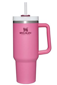 a pink travel mug with a straw sticking out of it