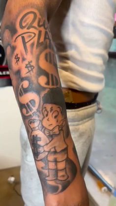 a person with a tattoo on their arm