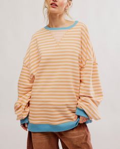 Free People Classic Striped Oversized Crew So cool and classic, this timeless crewneck is featured in an oversized, slouchy silhouette and staple striped print with contrasting hems for added dimension. Fit: Relaxed, oversized fitFeatures: Crew neckline, dropped shoulders, contrast hemsWhy We <3 It: Lovely for layering or styling solo, this so tried and true piece is the perfect effortless essential your wardrobe has been wanting. Fit Note: This style may run large. For a truer fit, we recommend Stripe Sweatshirt, Oversized Crewneck, Southern Shirts, Striped Sweatshirts, Tried And True, Oversized Silhouette, Pullover Jacket, So Cool, Pullover Sweatshirts