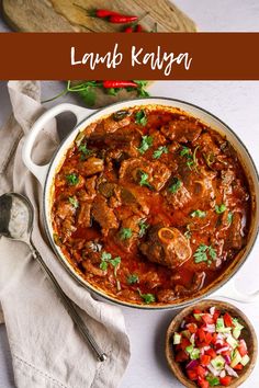 a large pot filled with meat and vegetables next to a small bowl full of salsa