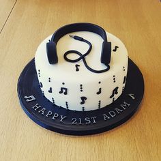 a birthday cake with headphones on it