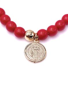 "Saint Benedict Red Beads Bracelet for Women This protection bracelet is made with 6mm Red beads 18K Gold Plated St. Benedict Medal, and two lucky charms on the sides (One Evil Eye & Genuine Azabache Jet Stone) Bracelet minimum size is 5.5\" inches or 14 cm and can be extended to 8\" inches or 20.2 cm approximately. This cute bracelet can be adjusted to a different length if needed. It's a great protection accessory for an everyday wear. Each item is carefully shipped in an organza pouch, bu Jet Stone, Benedict Medal, Red Beaded Bracelet, Evil Eye Protection, Organza Pouch, St Benedict, Saint Benedict, Red Beads, Lucky Charms