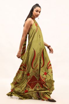 Olive green and red viscose crepe maxi dress with floral, paisley and geometric print and frilled hem.
Components: 1
Pattern: Printed
Type Of Work: Floral, Paisley, Geometric
Neckline: Halter
Sleeve Type: Sleeveless
Fabric: Viscose crepe
Color: Green
Other Details: 
Closure : Tie-up detailing
Occasion: Party - Aza Fashions Sleeveless Green Floral Maxi Dress, Festive Green Maxi Length Dress, Festive Green Maxi Dress, Red Silk Flowy Maxi Dress, Green Flowy Sleeveless Maxi Dress, Floor-length Green Maxi Dress With Floral Print, Festive Green Silk Maxi Dress, Green Floor-length Floral Maxi Dress, Festive Long Green Dress