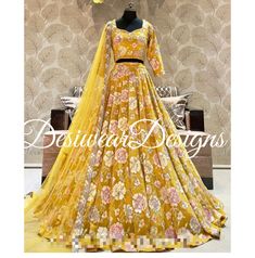 Made to Order/Measurement/Custom Order Lehenga - Color : Yellow - Fabric : Embroidered Georgette  - Fully flared paneled lehenga -   Attached  Dupatta with Blouse - Drawstring closure with Tassels - - It can be customize in any design or size  PLEASE NOTE: BUYERS ARE RESPONSIBLE FOR ANY CUSTOMS AND IMPORT TAXES THAT MAY APPLY. This is a made to order product. If you opt for 'Made To Measurement Option', we will provide a measurement template and you can share the measurements likewise. If you want to opt for 'Standard Size', Please refer to the size chart provided in the listing. Shipping: Standard Shipping is done by DHL ecommerce and it mostly takes 2 to 3 weeks to deliver after dispatch. Express Shipping is done by DHL express and it mostly delivers within a week after dispatch. Fabric Gold Floral Embroidered Wedding Set, Gold Floral Embroidery Wedding Set, Yellow Resham Embroidery Anarkali Set, Yellow Saree Set With Zari Work, Fitted Yellow Anarkali Set With Resham Embroidery, Yellow Anarkali Set For Reception, Fitted Embroidered Yellow Anarkali Set, Yellow Floral Embroidered Sharara For Reception, Reception Yellow Floral Embroidered Sharara