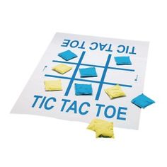 a tic tac toe board with pieces of blue and yellow paper on it