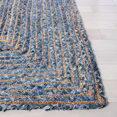 a blue and yellow rug on the floor