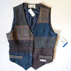 Beautiful Button-Down Herringbone, Patchwork Look, Plaid, Wool Vest In Grays, Blues, Red Burgandy, Brown, And Gold. The Size On The Tag Is 14, But As Usual, Vintage Runs Smaller. I Wear A 10/12 Or Large Usually, And This Fits Me Well. Please Use Measurements To Gauge Whether It Would Fit You. Approximate Measurements 19" Pit To Pit 24" Long Made By International Scene Fyro Macedonia 100% Wool Nwt Vintage - What They Call Dead Stock Because It's New With Tag, But Vintage Mens Patchwork Vest, Vintage Sweater Vests, Funky Fitz, John Keating, Gender Bend, 2024 Wardrobe, Grandpa Core