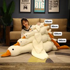 Looking for the perfect gift for a child or stuffed animal lover in your life? Look no further! Our Giant Lying Duck Plush Toy is sure to be a hit. Made of soft, cuddly materials, this adorable animal is great for snuggling and playtime. Available in three colors – brown, grey, and white – and four sizes, you're sure to find the perfect fit. Not only is it cute and fun, but it's also durable and easy to clean. Give the gift of love and laughter with this sweet stuffed duck. Goose Plush, Big Pillow, Construction Lego, Australian Gifts, Duck Toy, White Goose, Sleeping Positions, Cute Stuffed Animals, Sewing Toys