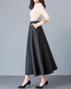 * A high-end long wool skirt with wide hem, very cool. * Made of wool blends, fully lined and with two side pockets. * Fixed waist on front, partial elastic waist on back and side invisible zipper. * Can custom make waist size and skirt length. * Material: Outer-50% wool, 50% polyester; lining-100% polyester * Washing instructions: Dry Clean Only * Size: True to US size, US 0-US 20 are available, you can let us know your usual size and height in your order. * Shipping: Free shipping Processing t Winter Long Skirt With Pockets, Long Skirt With Pockets For Winter, Winter Bottoms With Pockets, Long Skirt Style, Brown Wide Leg Winter Skirt, Winter Full Skirt Bottoms With Pockets, Wool Maxi Skirt For Fall Workwear, Winter Wide Leg Skirt With Pockets, Long Skirt With Pockets For Fall, Long Fall Skirt With Pockets