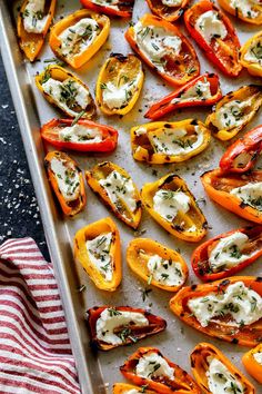 baked stuffed bell peppers on a baking sheet