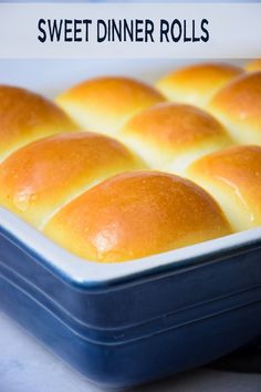 a baking pan filled with rolls and the words sweet dinner rolls in front of it