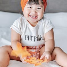 Celebrate your little pumpkin this fall. Simple and comfortable is best, especially for babies. Our adorable bodysuit is perfect for all sizes and activity levels, from your little one's first day in the world to their first birthday celebration. Made from buttery-soft organic cotton, it features easy-snap fasteners for quick access when changing or bathing. 100% organic cotton G.O.T.S. certified non-toxic, eco-friendly dyes lead/nickel free snaps Also available in matching Toddler Tee Pumpkin Onesie, Jogging Stroller Travel System, Baby Clothes Brands, Organic Clothes, October Baby, Halloween Onesie, Body Suit With Shorts, Lucky Ladies, Organic Baby Clothes