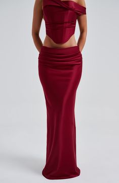 Oh she's luxury! Guaranteed to make you centre of attention, the Bernadette maxi crafted in our premium stretch satin, cut on the bias for a beautiful drape. This one-of-a-kind piece has a pleat detail to the front and diagonal seam at the knee. Pair with the Audra top for a dreamy, luxe look. 



Colour: Burgundy.

Luxury stretch satin fabric.

Fully lined.

Cut on the bias for a beautiful drape.

Pleat detail to front.

Diagonal seam at knee.

Invisible zipper fastening. Maxi length.

 Size: XS, S, M, L, XL, XXL