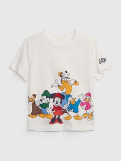 Made with 100% organically grown cotton.  Organic cotton is better for people and the environment because it's grown without the use of harmful synthetic pesticides and fertilizers.  Soft knit graphic T-shirt.  Crewneck.  Short sleeves.  Mickey Mouse and friends graphics at front.  Gap logo at sleeves.  Straight, easy fit.  Hits at the hip. Toddler Disney Outfit, Disneyland Family Shirts, Cute Disney Shirts, Disney Bound Outfits Casual, Mickey Mouse Outfit, Disney Themed Outfits, Disney With A Toddler, Baby Boy Tops, Disney World Outfits