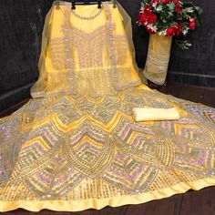 Double your fashion flair as you wear this yellow colored anarkali suit. This net suit is beautifully adorned with embroidered work comes along with santoon silk bottom, heavy japan satin lining and net dupatta which makes it appear more adorning. Women can buy this suit to wear for their upcoming festivals, homely functions, parties, kitties, weekend get together. Get this unstitched suit stitched according to your fit and comfort. Team it with stylish accessories to make your looks more beautiful. Note:- The actual product may differ slightly in color and design from the one illustrated in the images when compared with computer or mobile screen. Size Chart Size: Semi Stitched/Unstitched can be altered from maximum to minimum size based on size chart Net Suit, Party Wear For Women, Bottom Heavy, Butterfly Net, Gown Suit, Pakistani Party Wear, Designer Anarkali, Silk Bottoms, Anarkali Gown