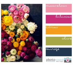 a bouquet of flowers sitting on top of a table next to a color swatch